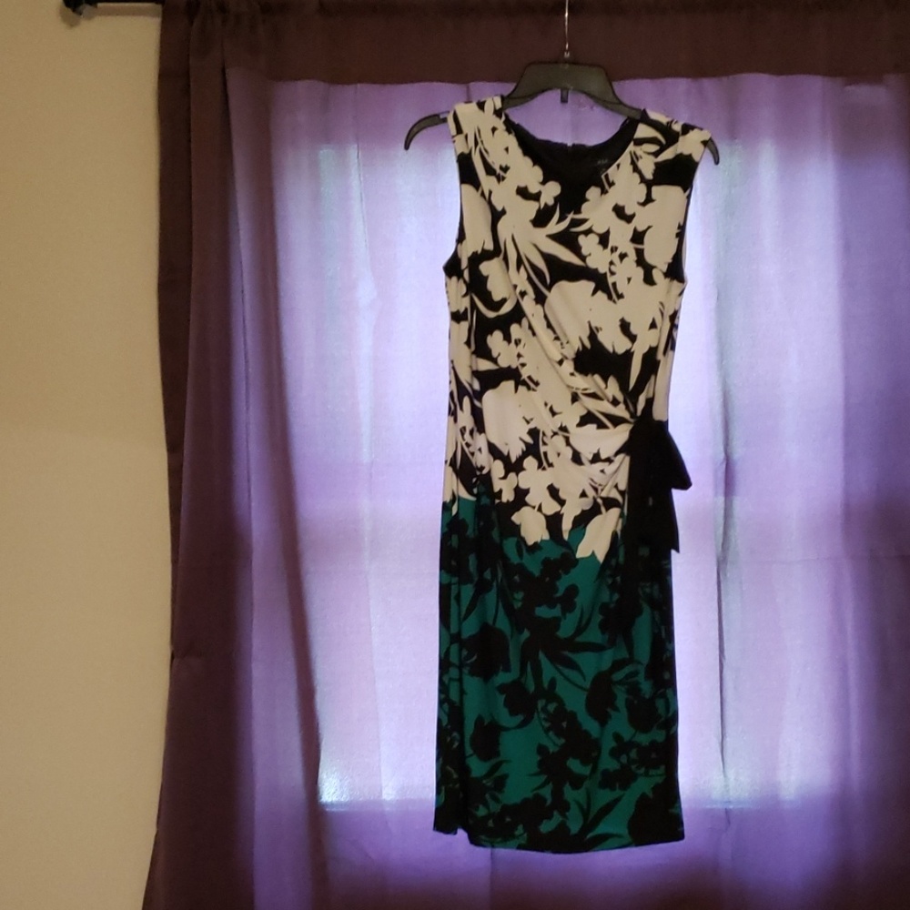 Black, white and green dress.